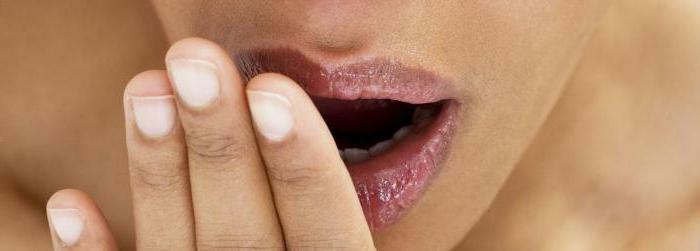 with stomatitis, the cheek swells up