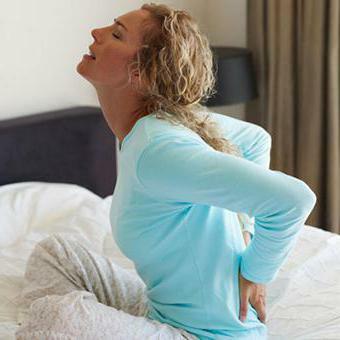 pain in the sacral spine in women causes